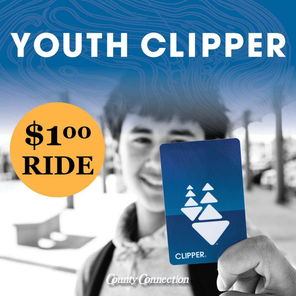 Image of a male youth holding up a Clipper card for Clipper Youth, $1.00 per ride. 